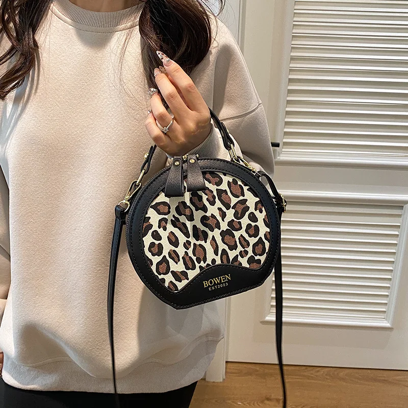

2025 Womens Trendy Checkered Crossbody Bag Stylish Round Shoulder Purse Premium Textured Handheld Tote Fashionable Niche Handbag