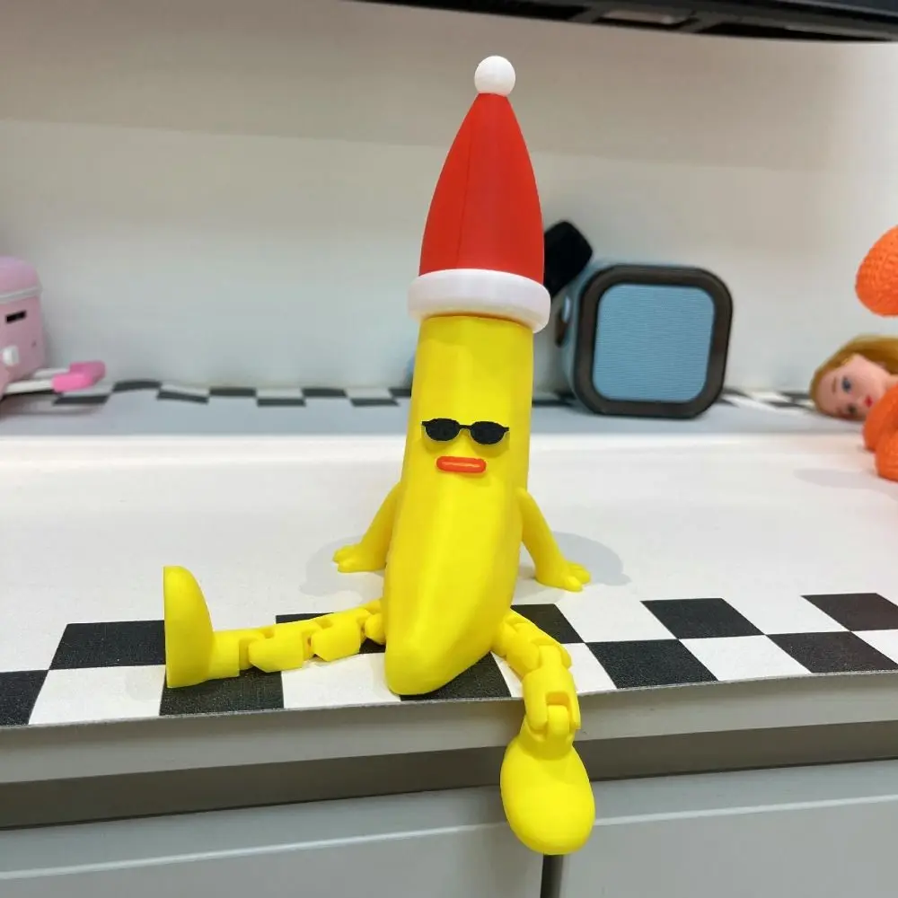 หมวกคริสต์มาส ของเล่นกล้วยพิมพ์ 3 มิติ ข้อต่อหลายจุด ของเล่นกล้วยพิมพ์ 3 มิติ ข้อต่อหลายจุด ของเล่นกล้วยขยับได้ ของสะสม