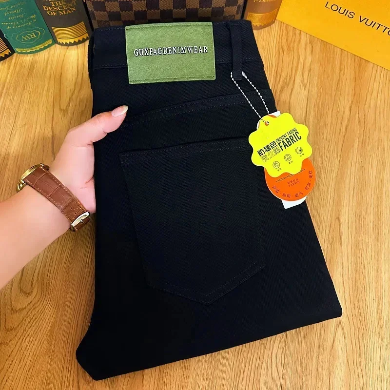 

Black jeans men's autumn and winter stretch slim fit small feet fashionable simple commuting clothing high-end denim pants