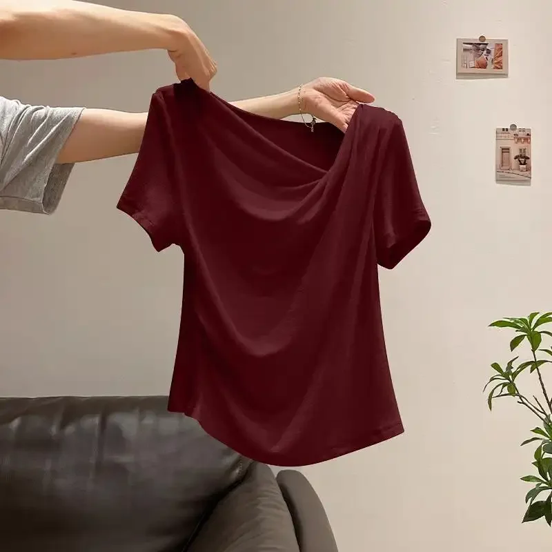 Damska bluzka z odkrytymi ramionami, asymetryczna, dopasowana, z nieregularnymi krótkimi rękawami, nowość na wiosnę i lato 2026, minimalistyczna, uniwersalna bluzka typu pulower.