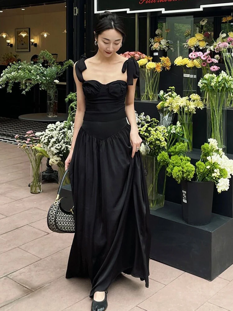 elegante-abito-nero-design-estate-2026-completo-due-pezzi-tonalita-fredde-stile-dea-casual-chic-abbigliamento-moda-donna