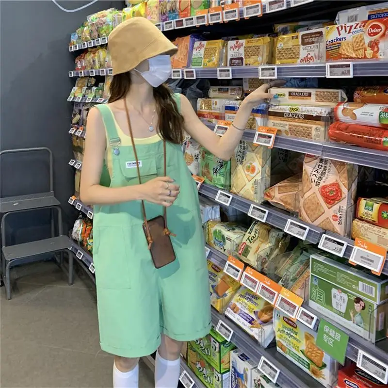 Damskie kombinezony, eleganckie czarne kombinezony, codzienne kombinezony jeansowe, czerwone zimowe bezrękawniki, szykowne niebieskie długie kombinezony imprezowe, duże rozmiary.