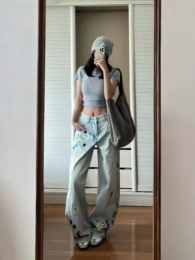กางเกงยีนส์ทรงหลวมพิมพ์ลายการ์ตูนสีน้ำเงินวินเทจ สไตล์ Y2K สำหรับผู้หญิง ฤดูใบไม้ร่วง 2025 สไตล์ฮาราจูกุ ขากว้าง เอวสูงทรงโอเวอร์ไซส์ ยุค 2000