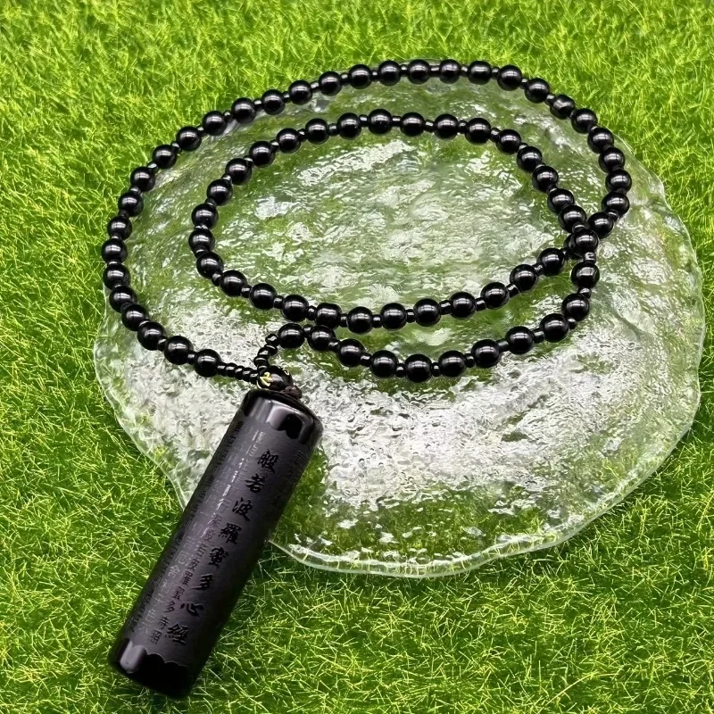 

Obsidian carved scripture pendant, handmade natural stone amulet