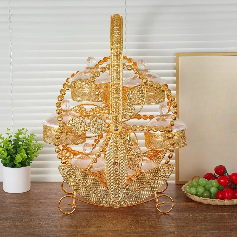 Squisito piatto di frutta acrilico in ferro battuto di fascia alta, mulino a vento creativo, vassoio rotante per snack, piatto di frutta per soggiorno, festa