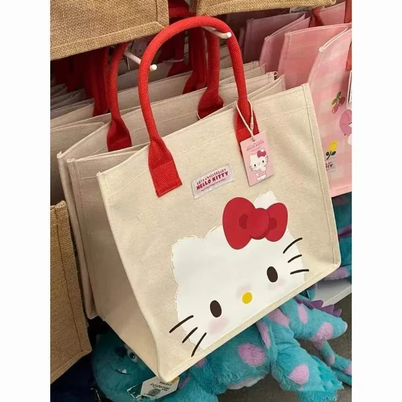 

Sanrio HelloKitty New Canvas Bag Japanese and Korean Cartoon Cute Creative Handbag Anime Print Shopping Bag Wholesale