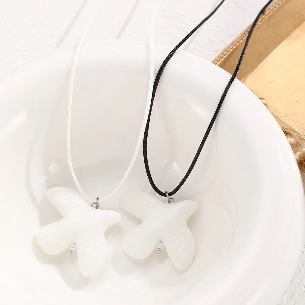 Einfache Persönlichkeit Weiße Keramik Taube des Friedens Anhänger Schwarz Leder Seil Lace-up Halskette für Frauen Tier Kragen Kette schmuck