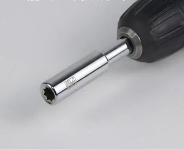 Electric drill with piano string shaft removal tool