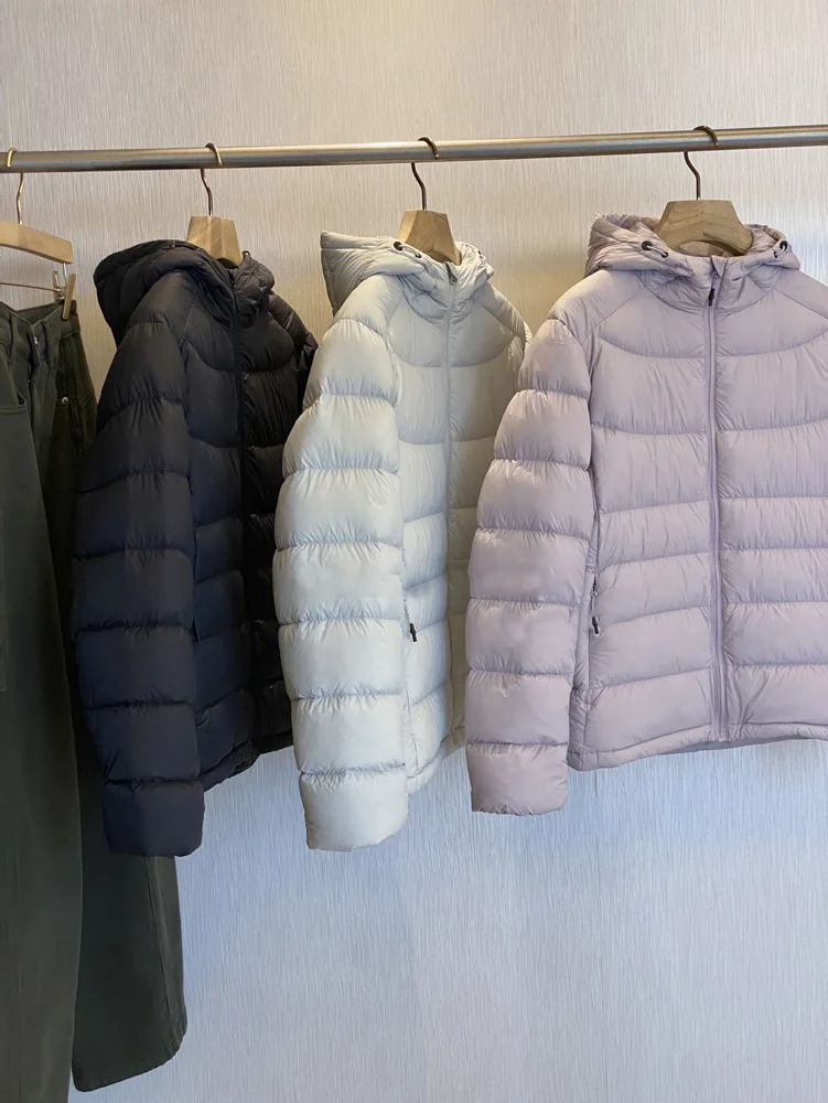 

Winter women's casual pure color white duck down outdoor waterproof hooded pork rib down jacket