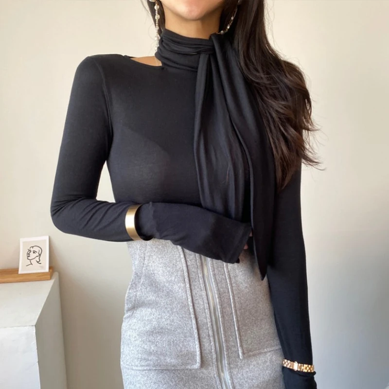 Camisetas coreanas de primavera 2026 para mujer, camisetas elegantes con un solo hombro, bufanda recortada, correa para el cuello, cuello simulado, Tops ajustados de manga larga con cuello alto