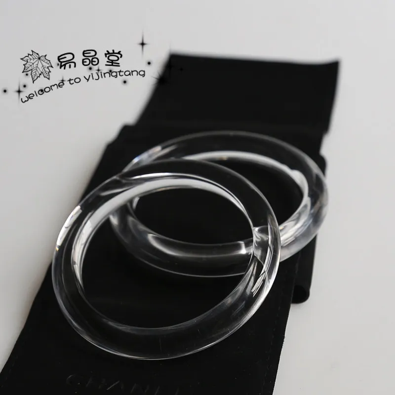 

Браслет из натурального белого кристалла 5А из прозрачного стекла. Изысканный тонкий плоский браслет с круглым стержнем.