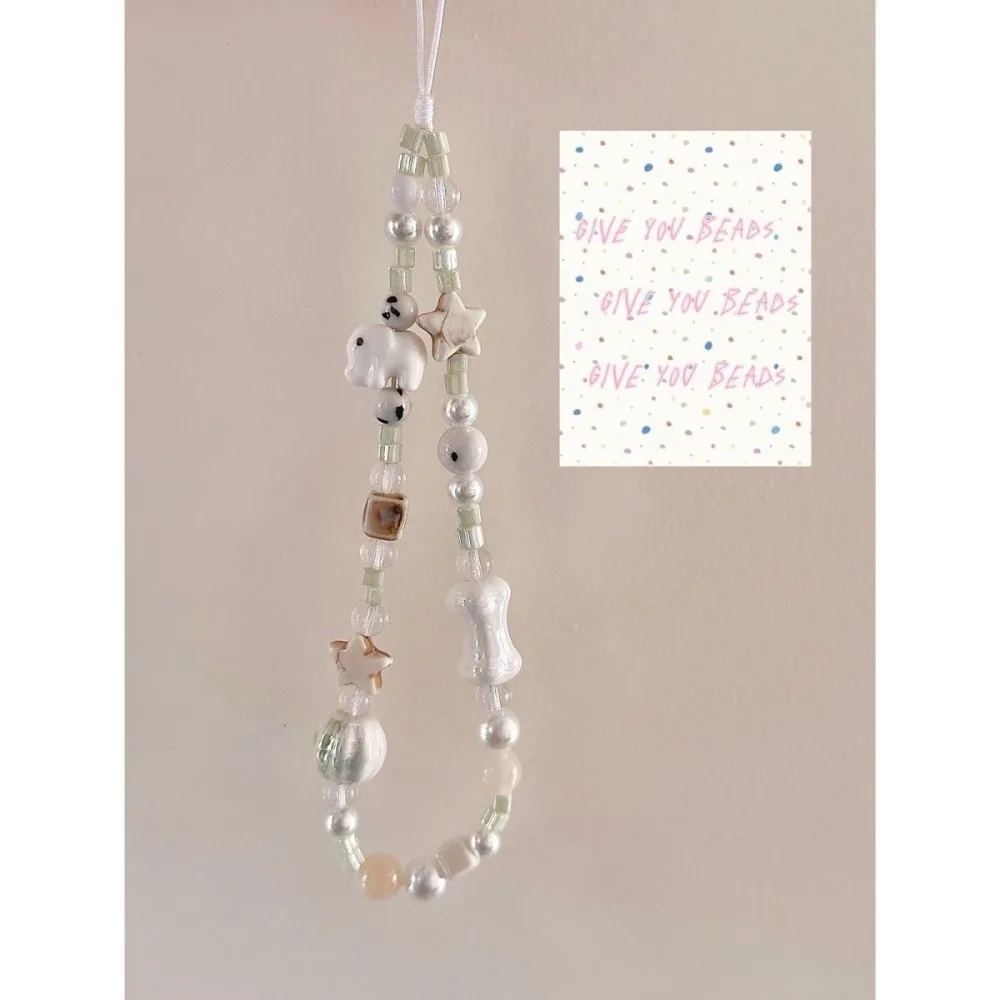 The Cute Milk White Set along with Elephant Beaded Phone Chain, Polaroid CCD Hanging Rope, Safety Rope, Handheld