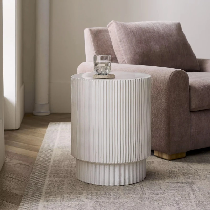 

Made of hand-molded semi-matte glaze and glazed for indoor/outdoor use, just the right height for drinks or books