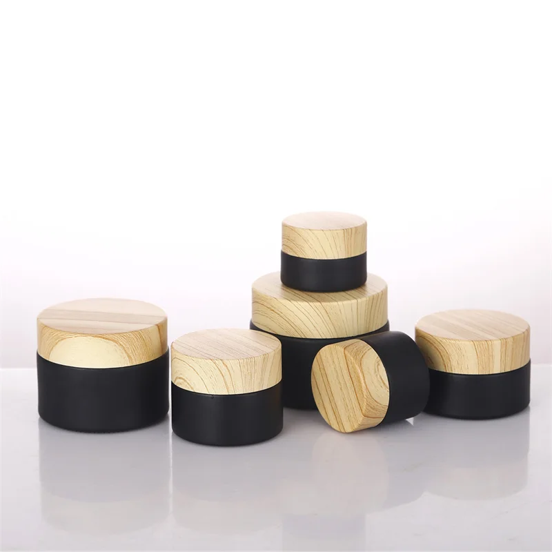 200pcs 1oz 2 oz 4 oz Cosmetic Black Frosted Glass Eye Cream Container Skincare Face Cream Jar with Bamboo Lid