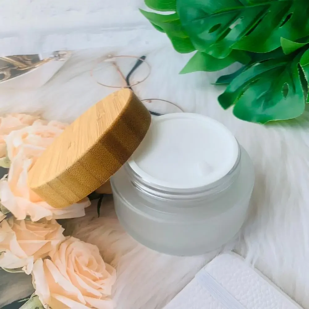 

Hot sale eco-friendly wooden lid bamboo cap Frosted Glass Jar eye cream hand cream jar travel necessary costemic glass container