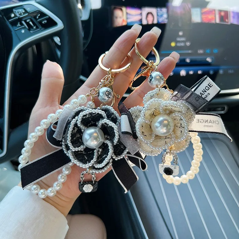 Creative Camellia Bow Bag Pendant Keychain Fashion Pearl Chain Korean Car Keychain Women\'s Circle