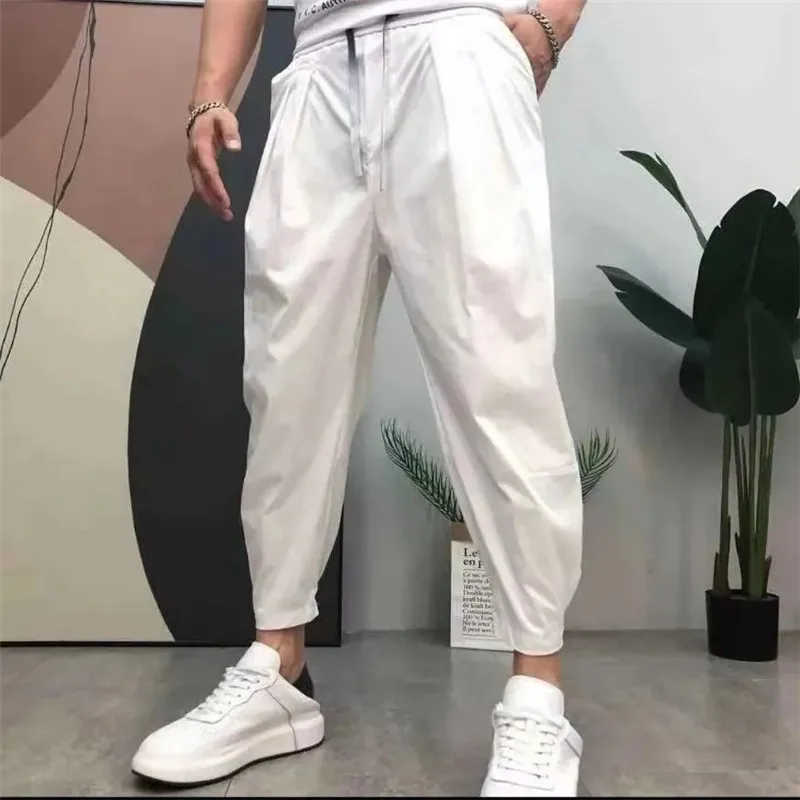 Pantalones elásticos holgados para hombre, ropa informal de seda de hielo de nueve puntos, moda coreana, Color sólido, combina con todo, novedad de verano 2024