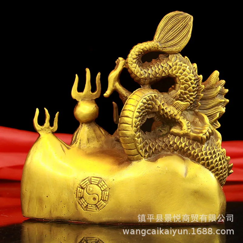 The copper fire-avoiding dragon ornament symbolizes resolving the issue of kitchen fires and is placed in the northwest corner o