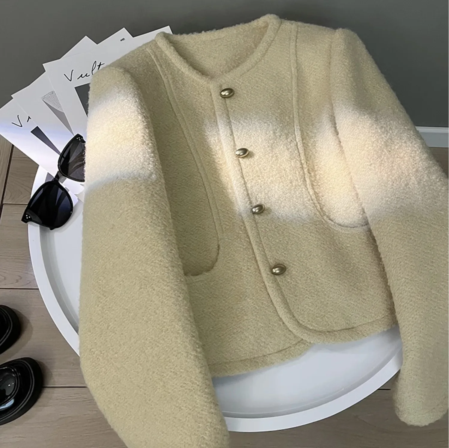 

Autumn and winter women's casual solid color round neck long sleeved jacket