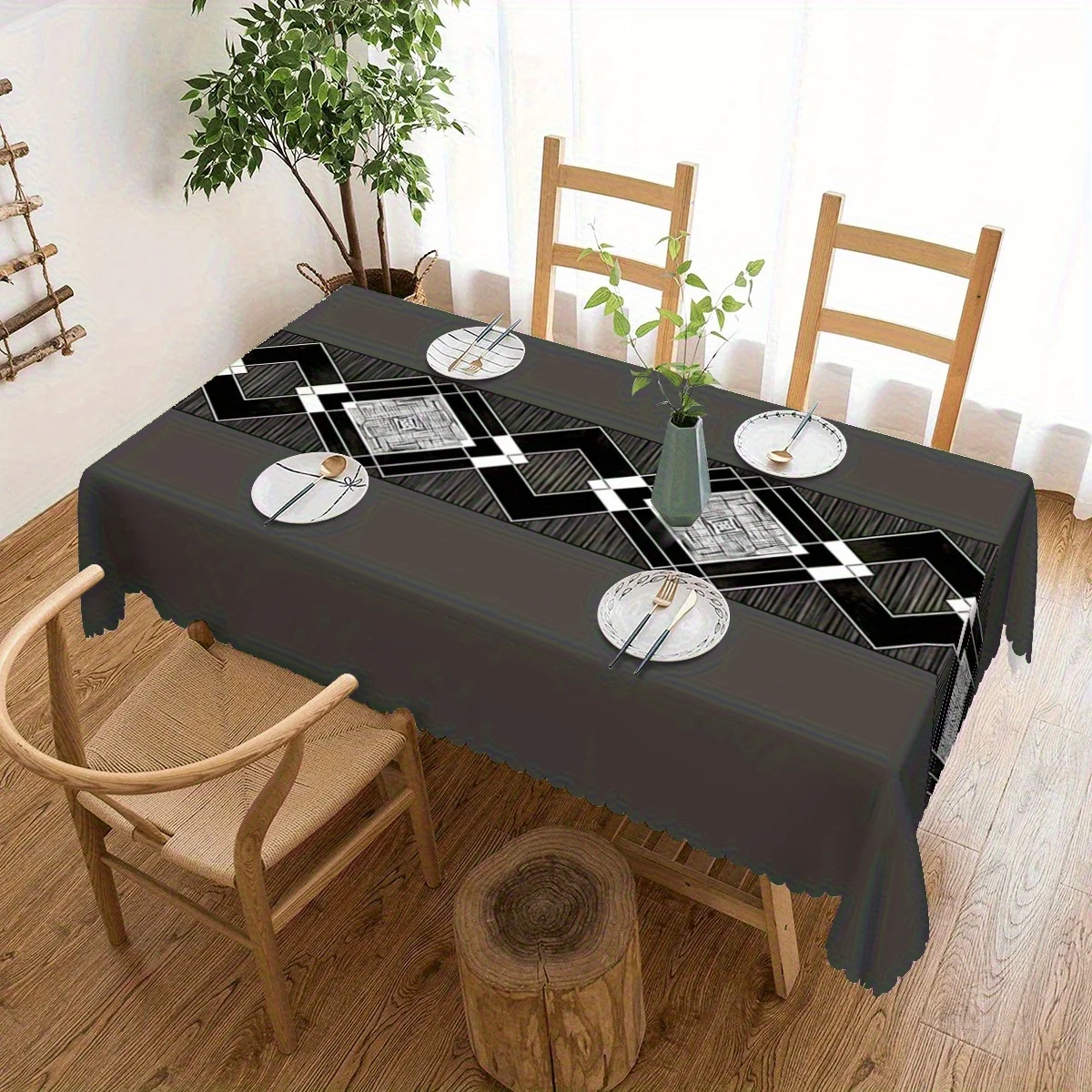 One geometric pattern printed tablecloth, made of polyester, with a gray background and black and white geometric patterns.