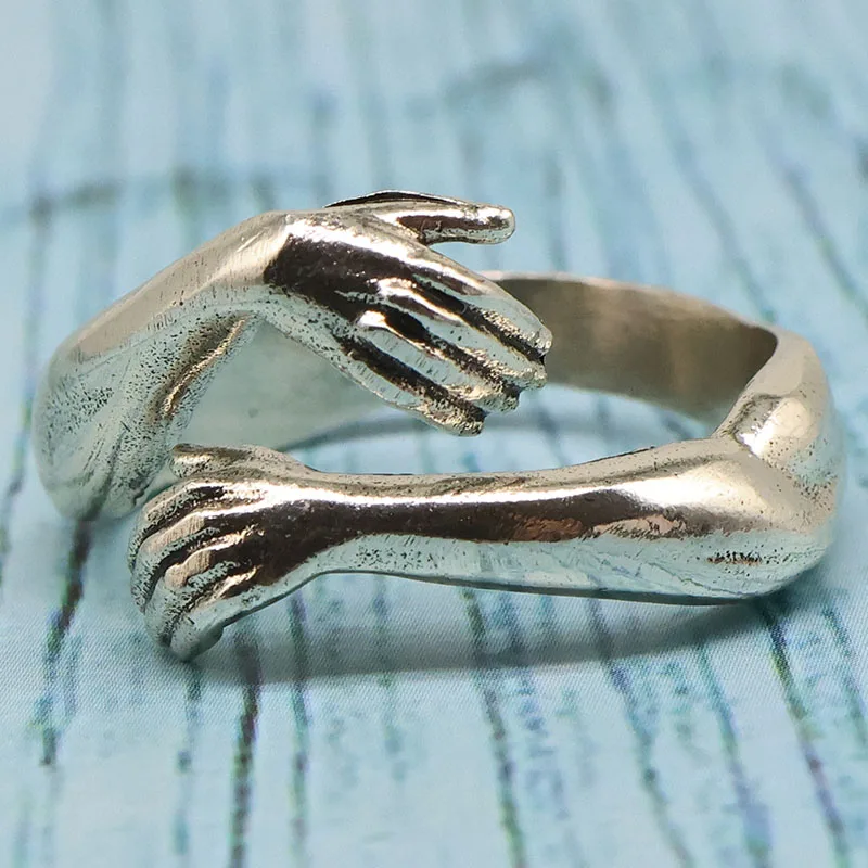 Buy 2 Get 1 Free This adjustable stainless steel 23x15mm 6g Ring Hands Hugging Finger