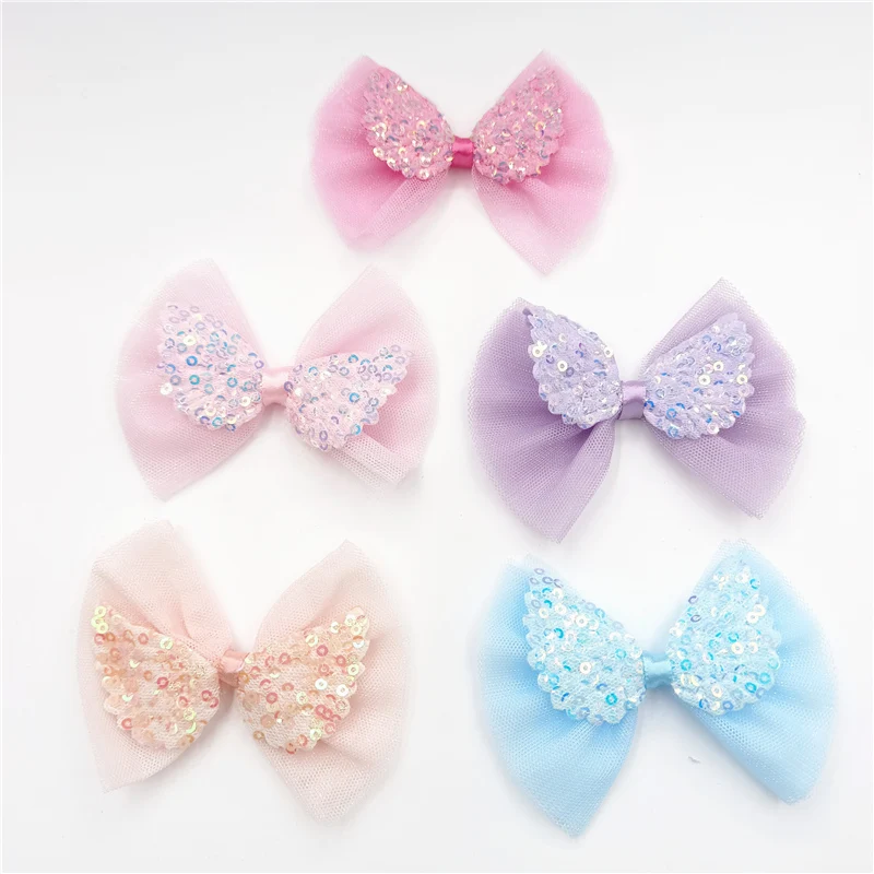 

Аппликация из блестящей ткани с бантом, 9x7,5 см, 10 шт.