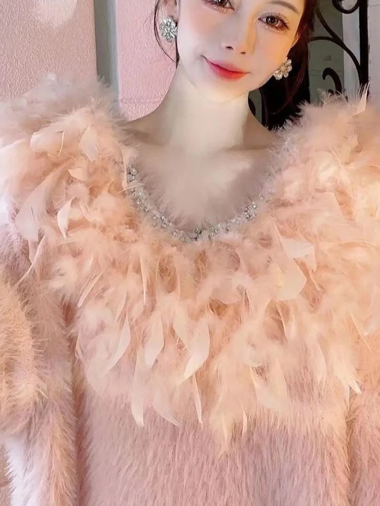 

Autumn Winter new heavy industry nail bead V-neck spliced feather loose unique and niche design women's knitted sweater