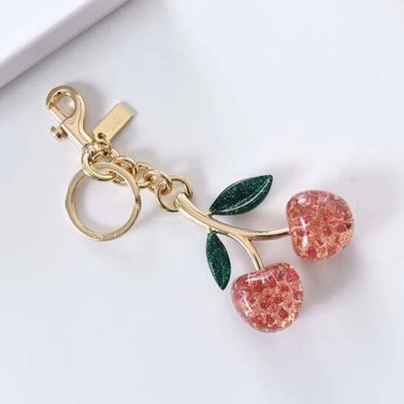 Unique and Cherry Bag Charm Decorations Elegant Resin Cherry Keychain Pendant Charm with Bright Colors for Bag Key