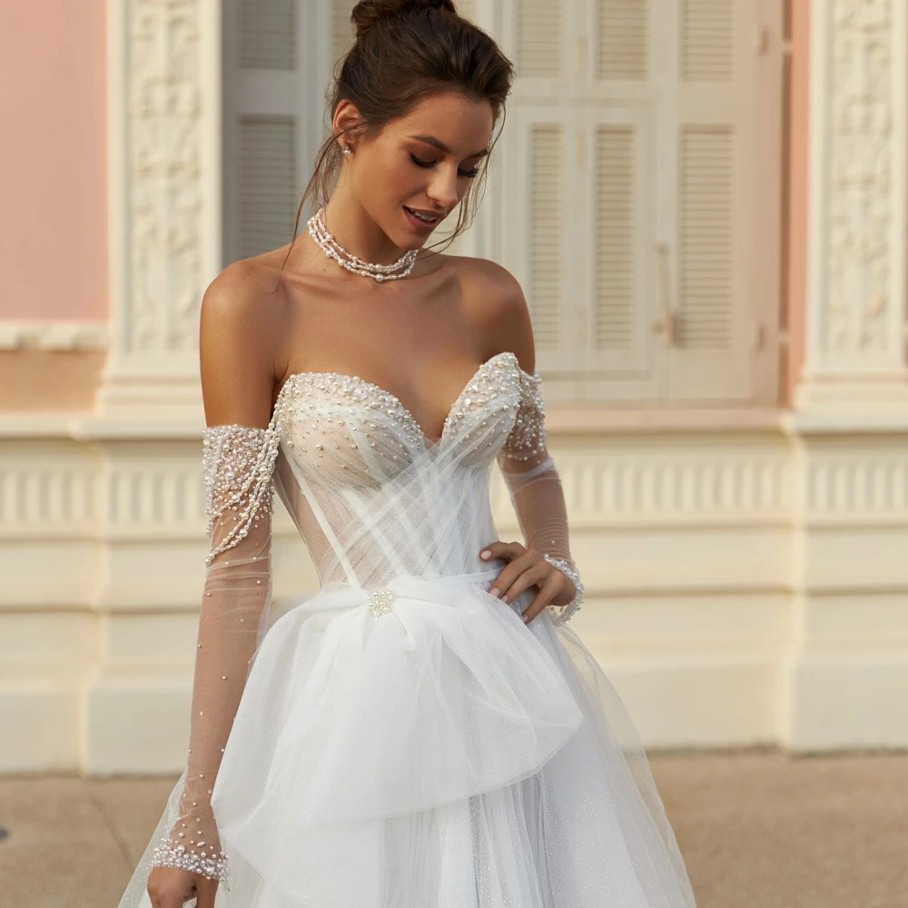 Shiny Hand-sewn Pearls Wedding Dress Sexy Backless Off The Shoulder Bride Robe Graceful A-line Long Bridal Gown Robe De Mariée