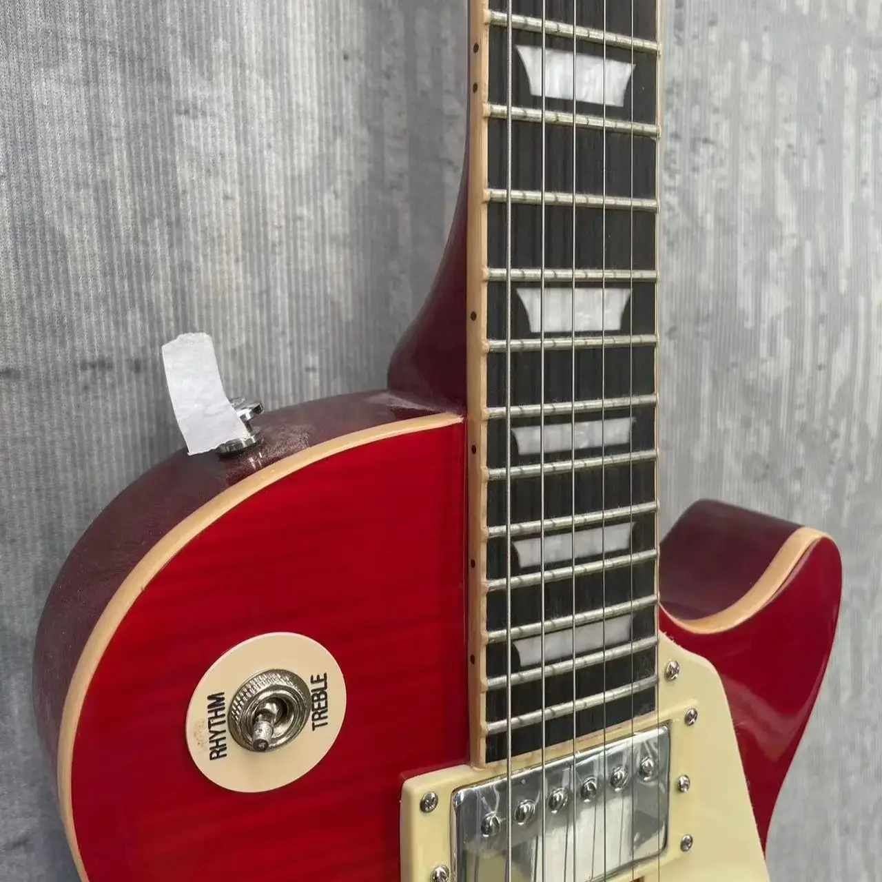 

have logo guitar, CS AAAA flame maple one pieces body neck, fret binding made in china