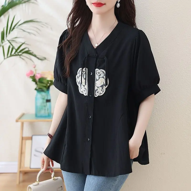 

Elegant V-Neck Button Folds Spliced Embroidery Shirts Women's Clothing 2025 Summer New Loose All-match Tops Vintage Blouses