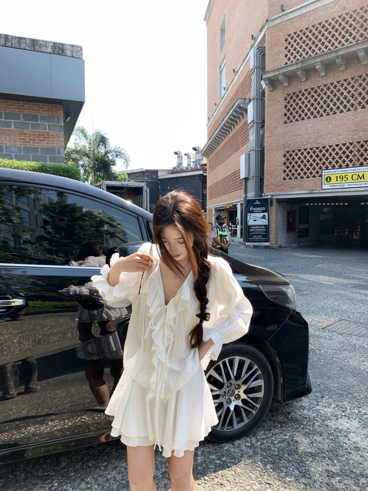 

Heavyweight Cotton Bubble Sleeve Top And Short Skirt Set by Xiao Jun Jun Brand Spring Fashion Collection Loose Fit Embroidered