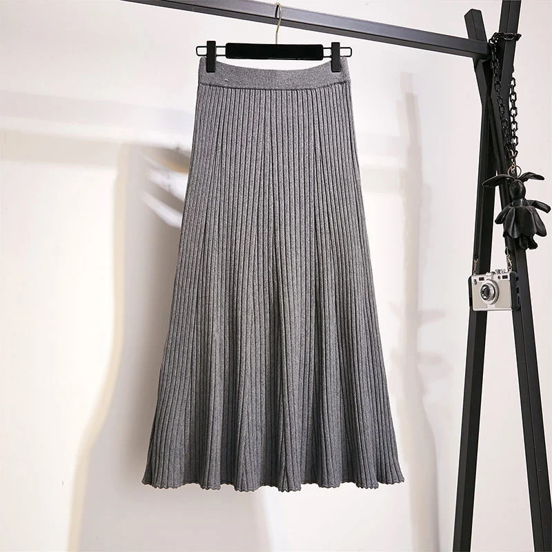 

Korean pit strip skirt women 2023 autumn and winter temperament solid A-line skirt shows solid high waist knitted skirt female