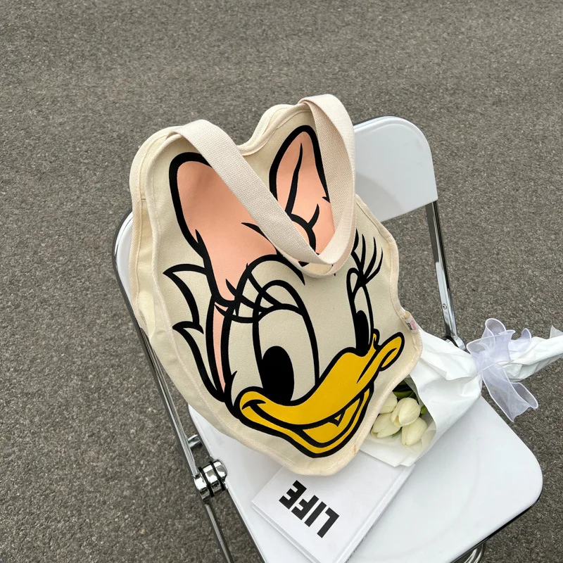 2023 New Disney Kawaii Anime Daisy Duck Canvas Cartoon Large-capacity Shopping Shoulder Bag Portable Fashion Girls Handbag Gifts