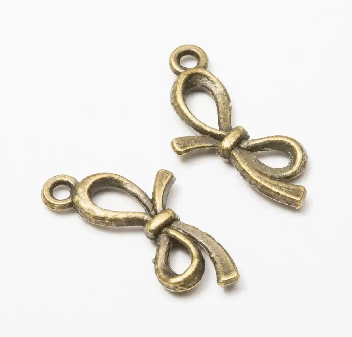 

30pcs 12*22 mm Zinc alloy metal knot pendants for jewelry handmade HWL2655