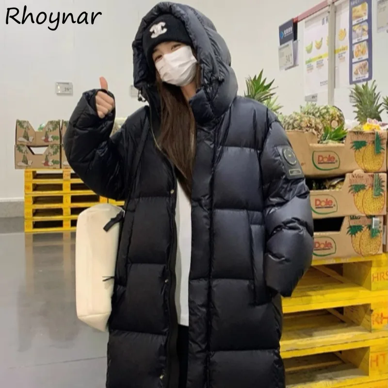 

Парки женские черные пуховые хлопковые зимние корейские модные свободные утепленные теплые длинные топы с капюшоном однотонные карманы на плечевом ремне шикарные