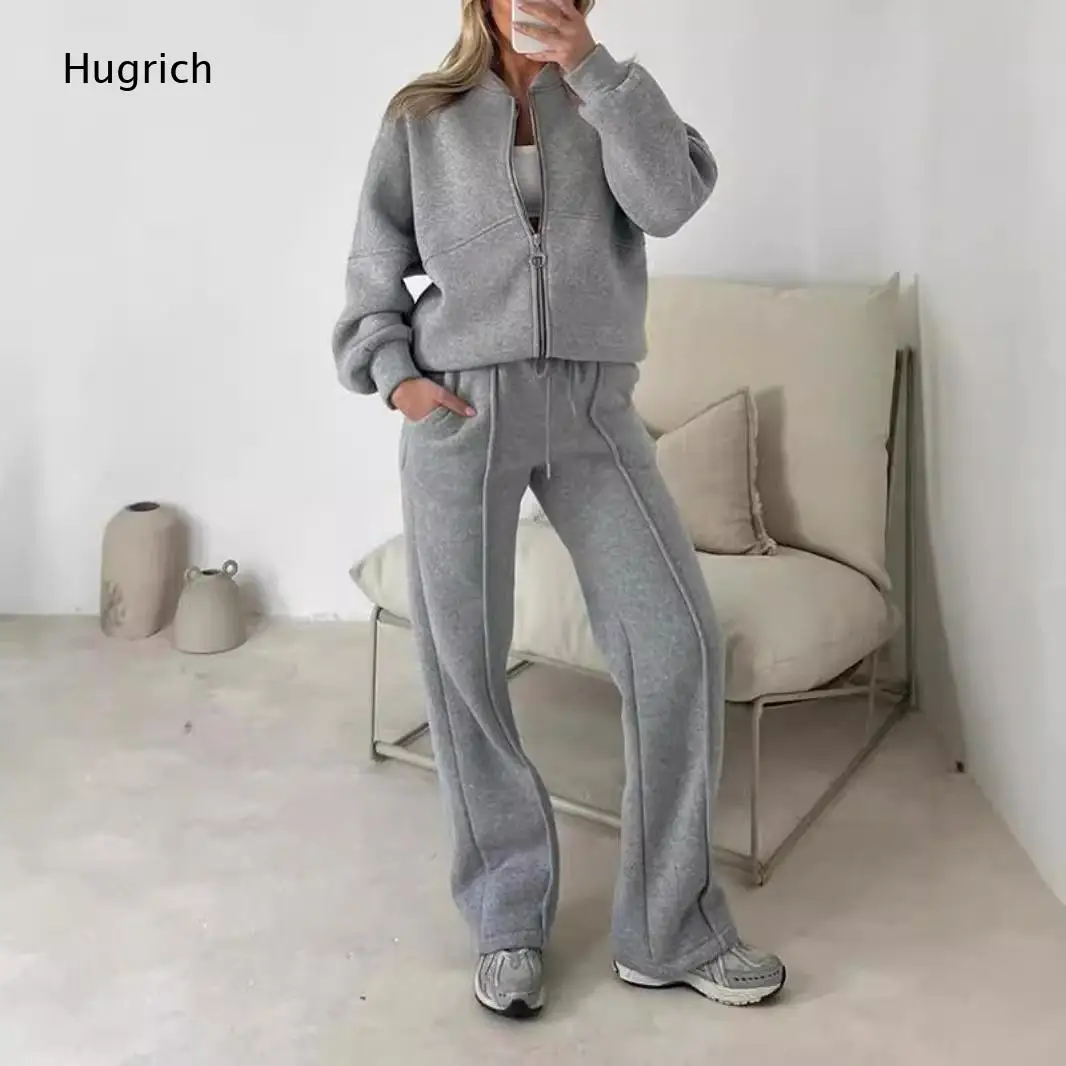 Conjunto deportivo informal de dos piezas para mujer, con chaqueta extragrande con cremallera y pantalones anchos con cordón ajustable.