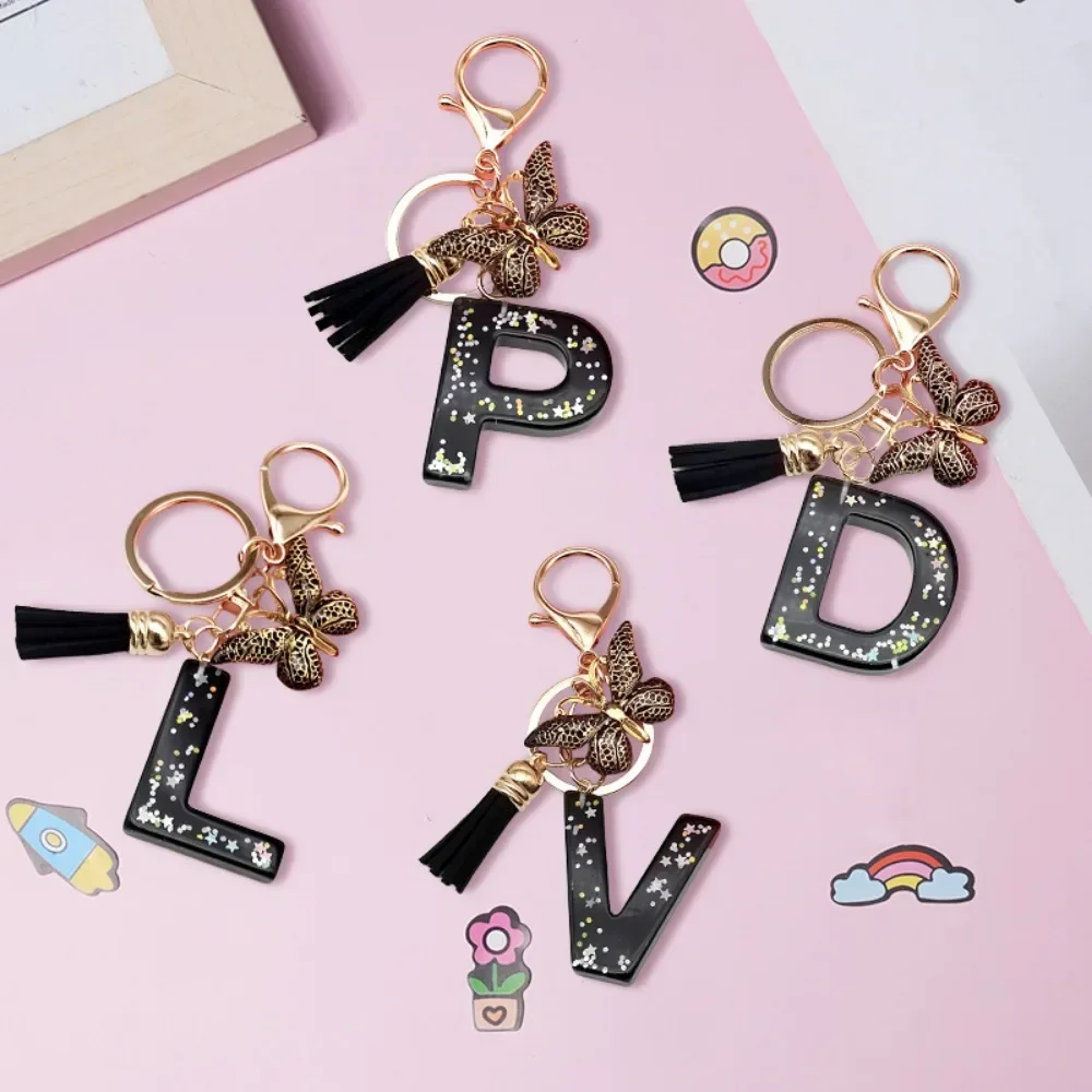 A-Z preto 26 iniciais chaveiro requintado borboleta borla letras chaveiro para mulheres masculino bolsa ornamentos carro bugigangas jóias