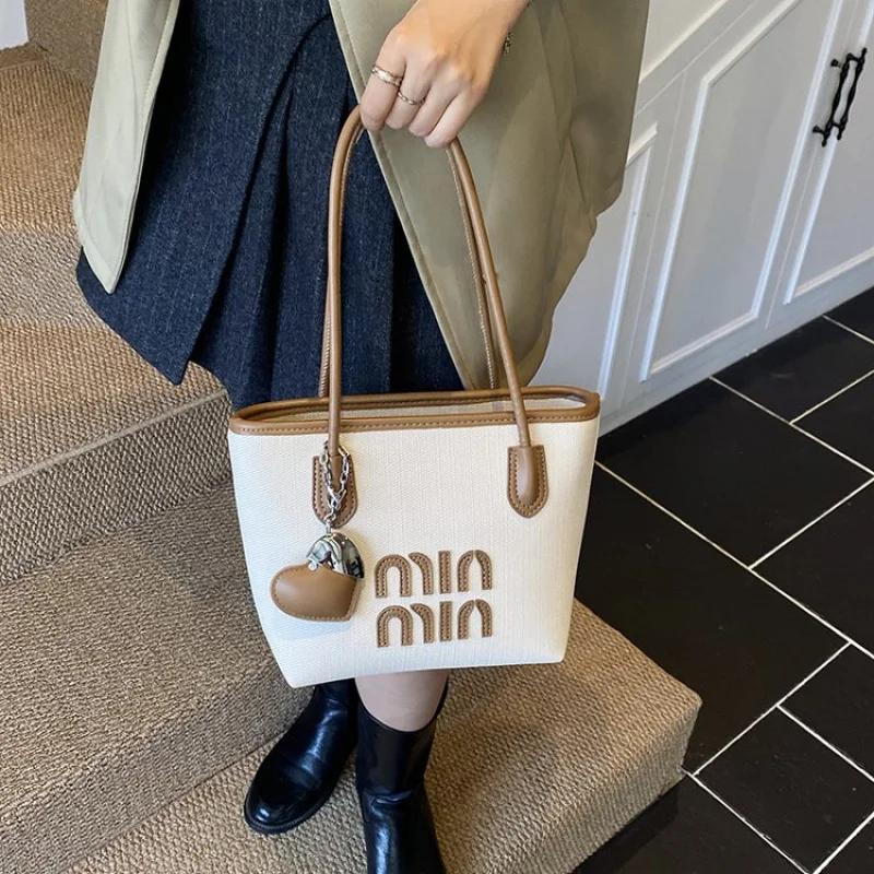 

High-Fashion Women's Crossbody Bag With Geometric Design And Modern Architectural Shape For The Style Conscious