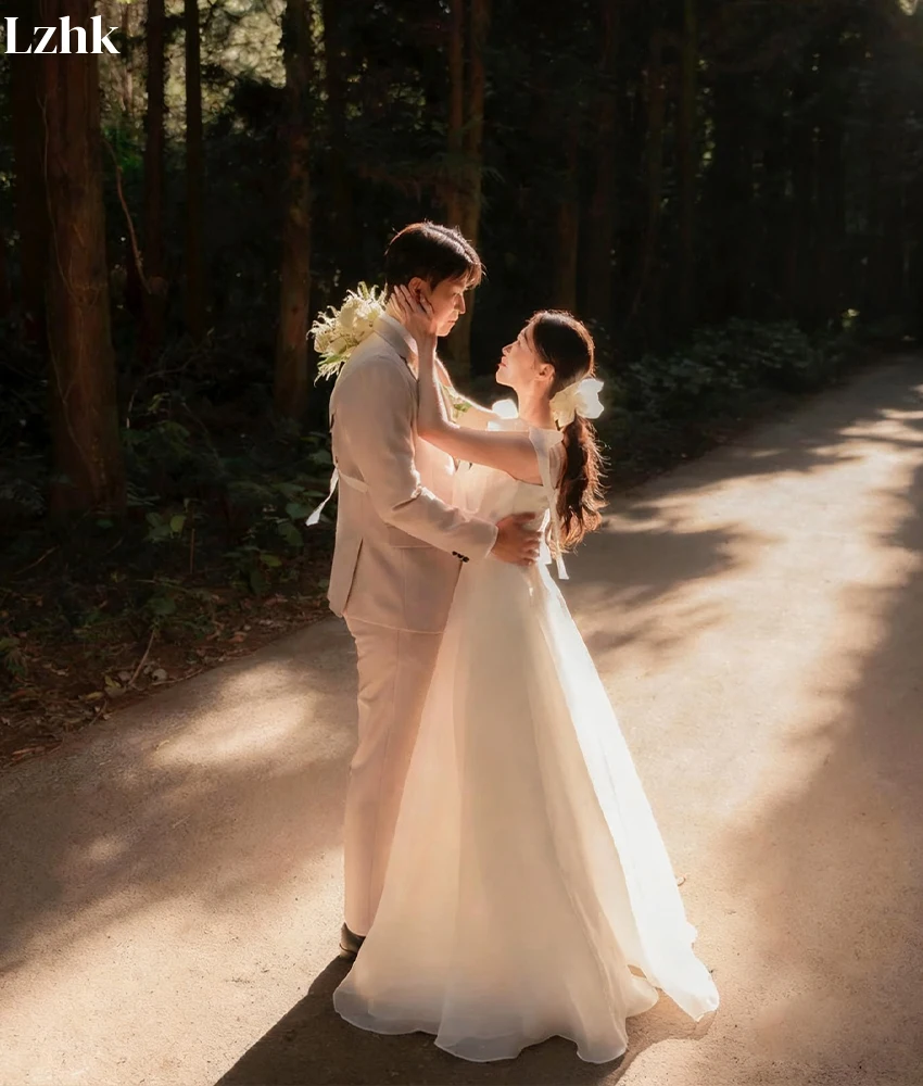 ชุดราตรีทรงเอไลน์ผ้าทูลล์คุณภาพสูงแบบสั่งทำพิเศษ สายเดี่ยวแบบสปาเก็ตตี้ ประดับโบว์ 3 มิติ ดีไซน์ทันสมัย ไม่มีสายคล้องไหล่ สำหรับงานแต่งงาน