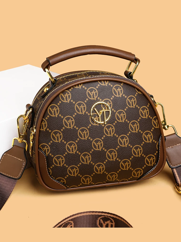 

Кожаная круглая сумка с принтом, женская универсальная сумка через плечо, новинка 2026 года, из воловьей кожи, сумка для мамы, модная повседневная сумка