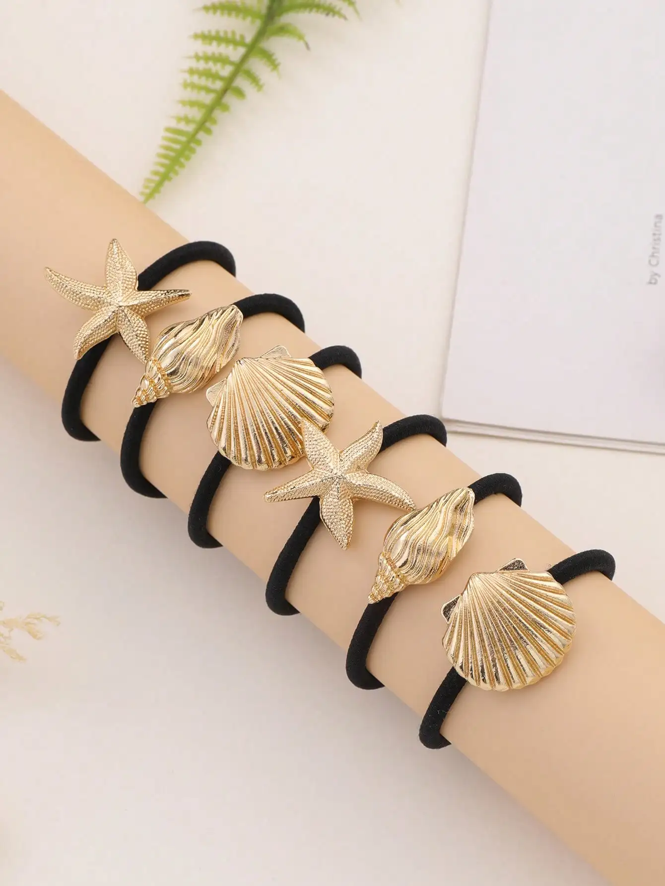 

Набор из 6 резинок для волос с золотистыми звездочками и ракушками, с черными эластичными лентами