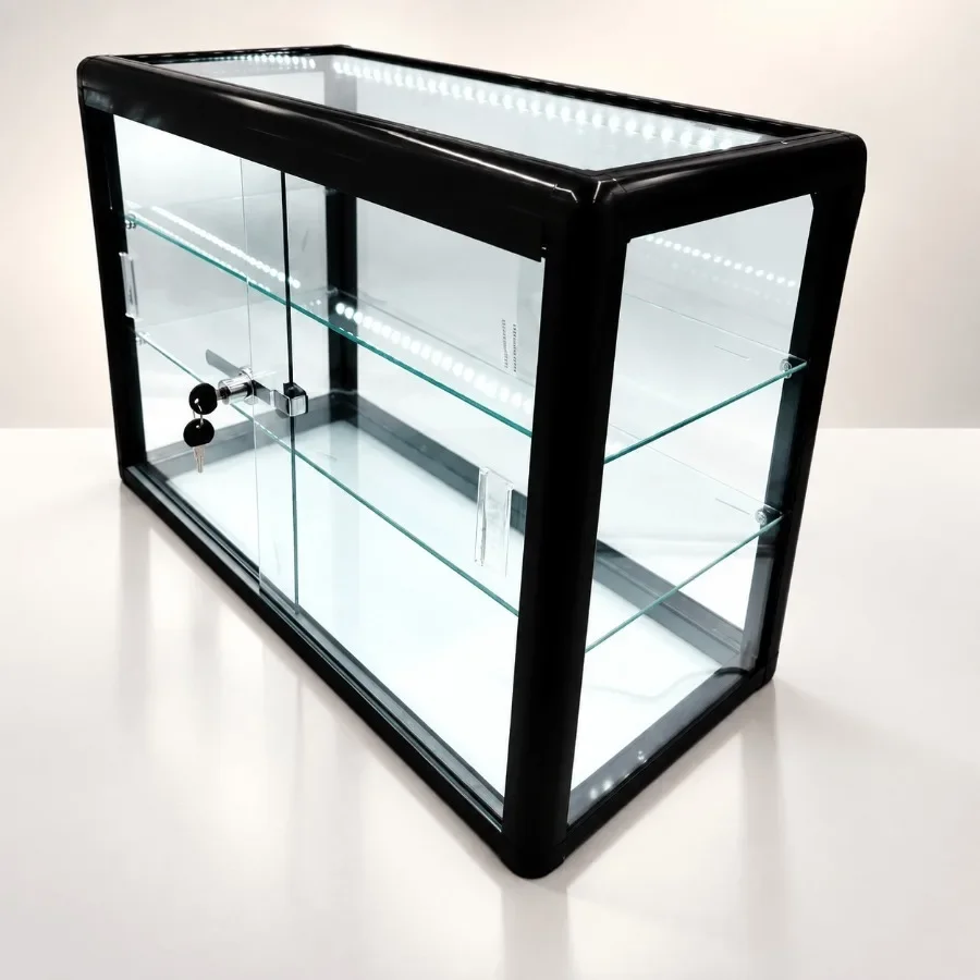 Elegant black aluminum display table top with tempered glass showcase for retail use, featuring sliding glass doors and lock