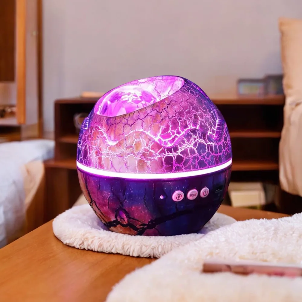 Enhance your childs room with this adorable and enchanting dinosaur eggshell night light projector. Create a dreamy and magical