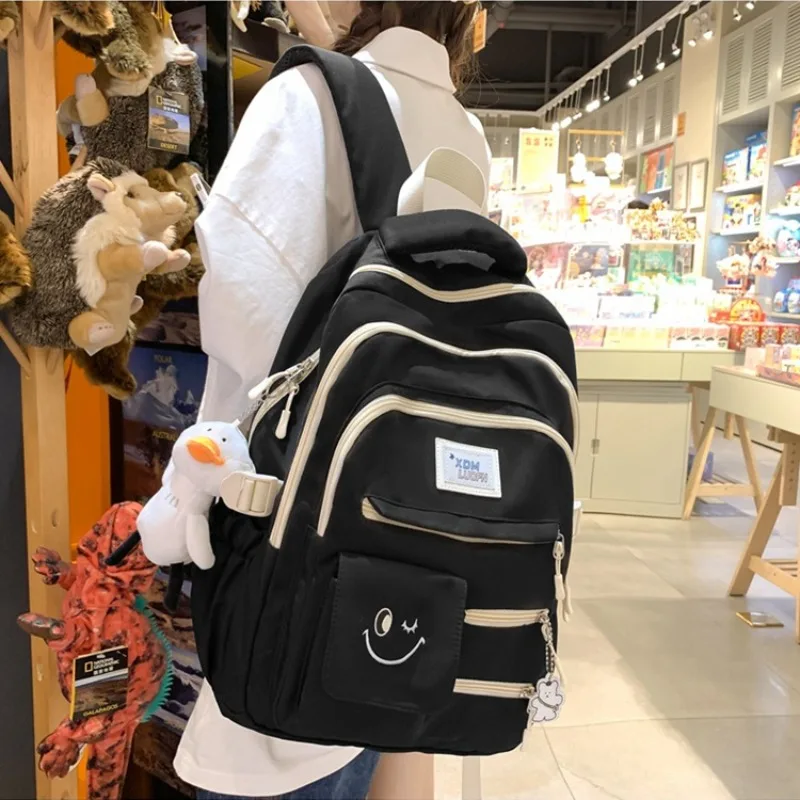 

New Colored Large Capacity Backpack 14 Inches Letter Smile Street Trendy Outdoor Travel Backpacks Schoolbag + Badge + Pendant