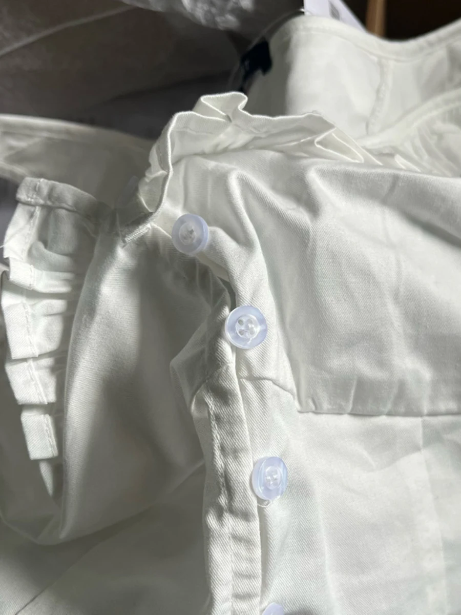 Dolce bianco volant bottoni Crop top donna estate cotone Scoop collo Preppy manica corta Tee Vintage Chic Slim carino t-shirt Y2K