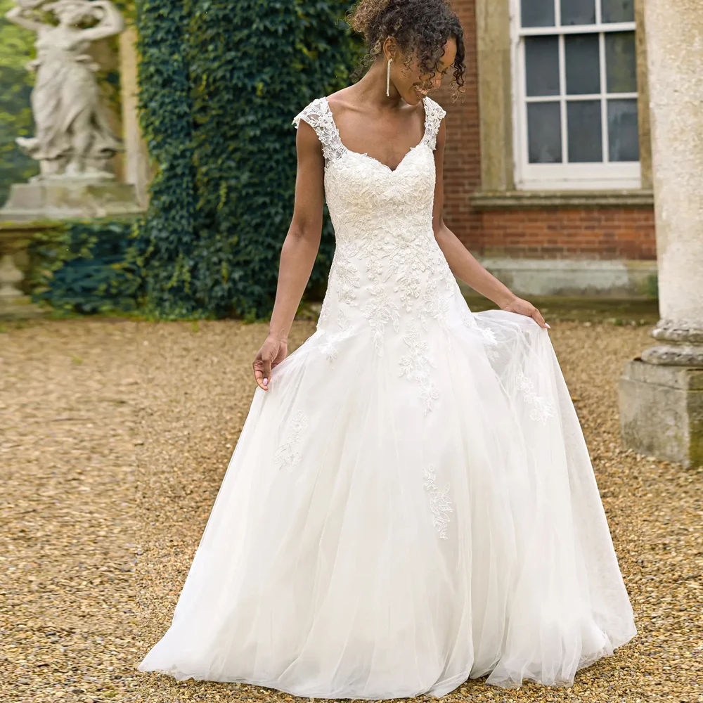 エレガントな V ネックのウェディングドレスワイドストラップブライダル成長アップリケレースイリュージョンカスタマイズ半袖 A ライン Vestidos デノビア