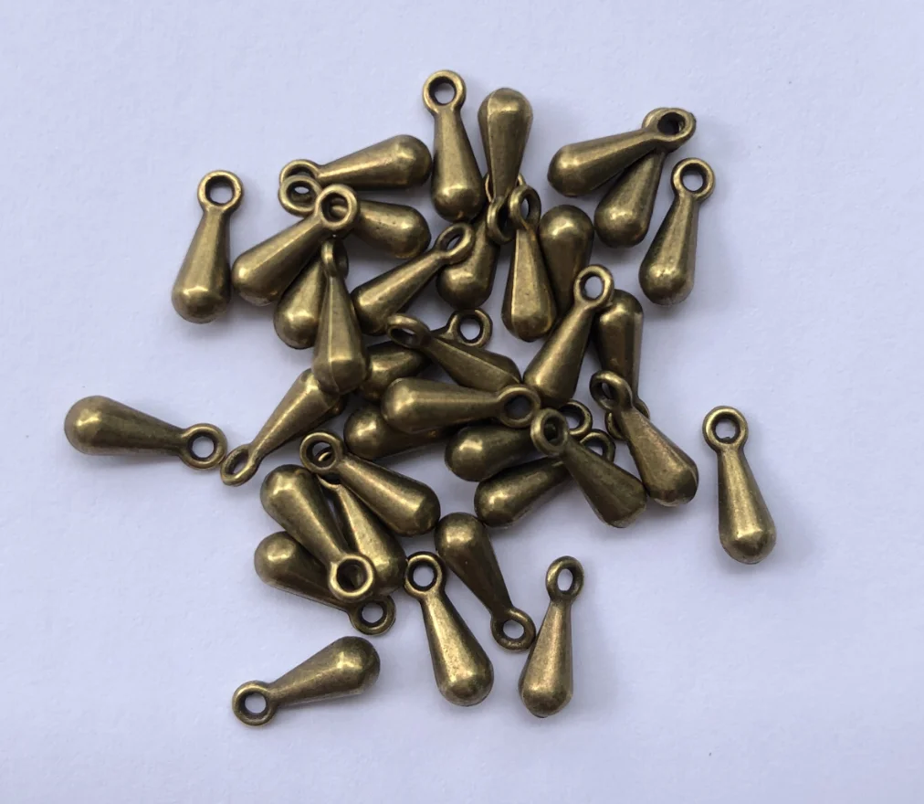 

50pcs 9*3mm Zinc alloy metal antiqued bronze color drop pendants for jewelry findings T0025CH