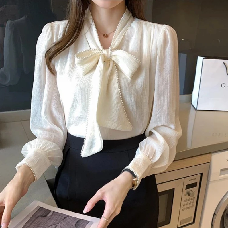 อารมณ์แขนยาวหลวมเสื้อแนวโน้ม Bow Lacing All-Match Elegant เสื้อฤดูใบไม้ผลิแฟชั่นผู้หญิงเกาหลีเสื้อผ้า