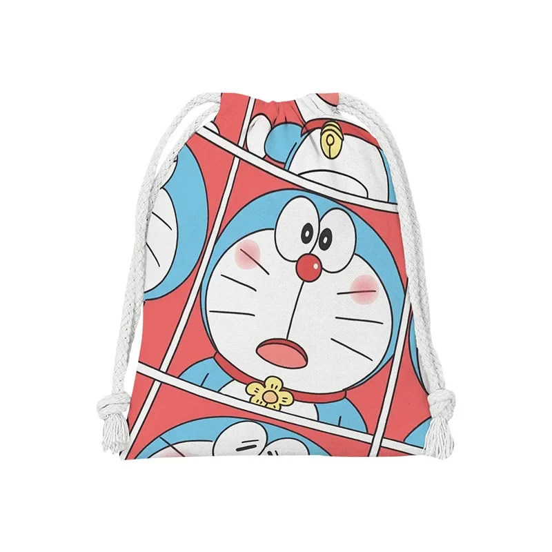 โดราเอมอนกระเป๋าเชือกผูกกระเป๋าผ้าน่ารักกระเป๋าการจัดเก็บของเบ็ดเตล็ดกระเป๋า tas kosmetik การ์ตูนอะนิเมะแบบพกพาถุงซักผ้าของขวัญสำหรับเด็ก
